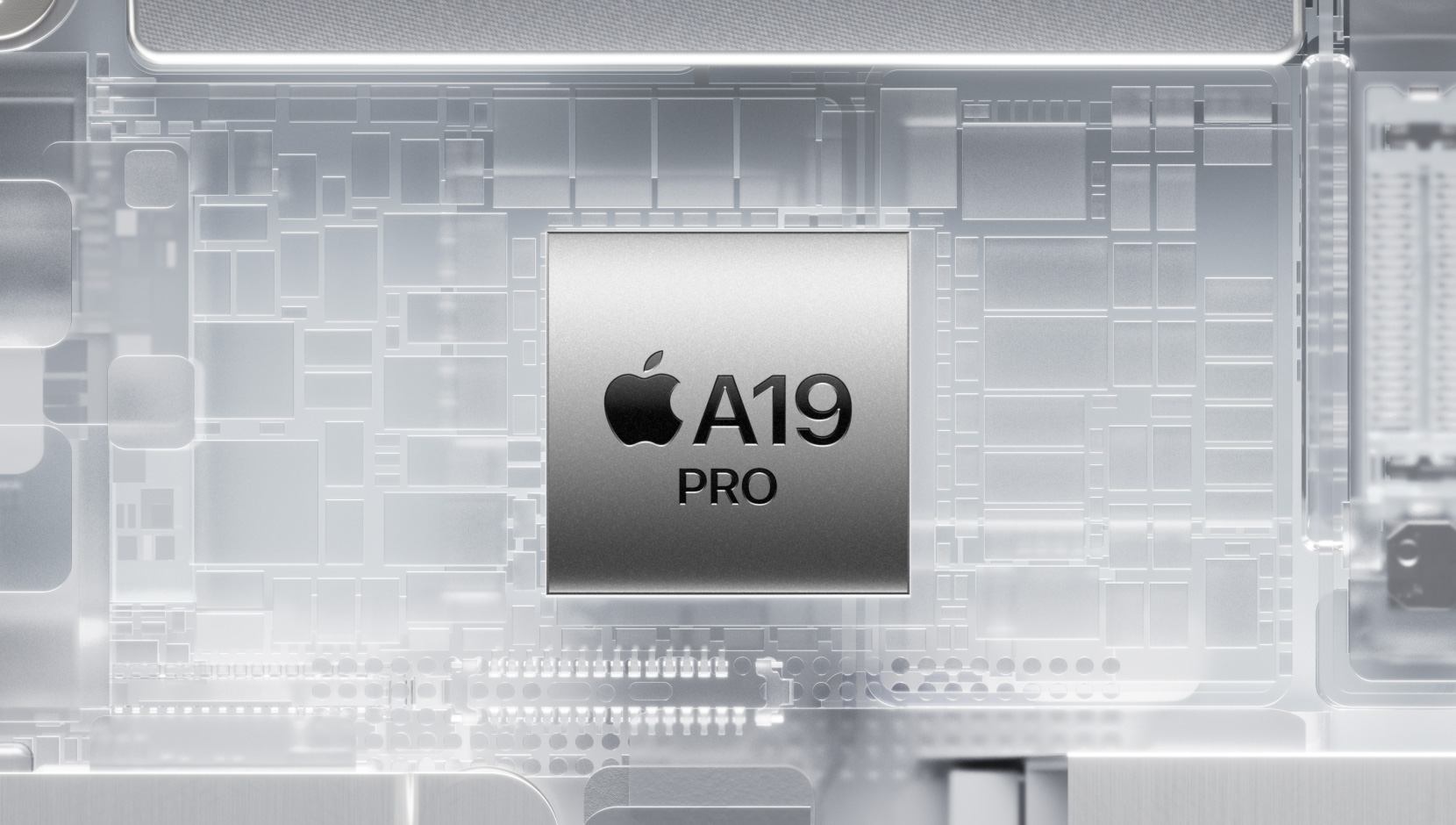 شريحة A19 Pro‏ محاطة بمكونات iPhone الداخلية المتوهجة